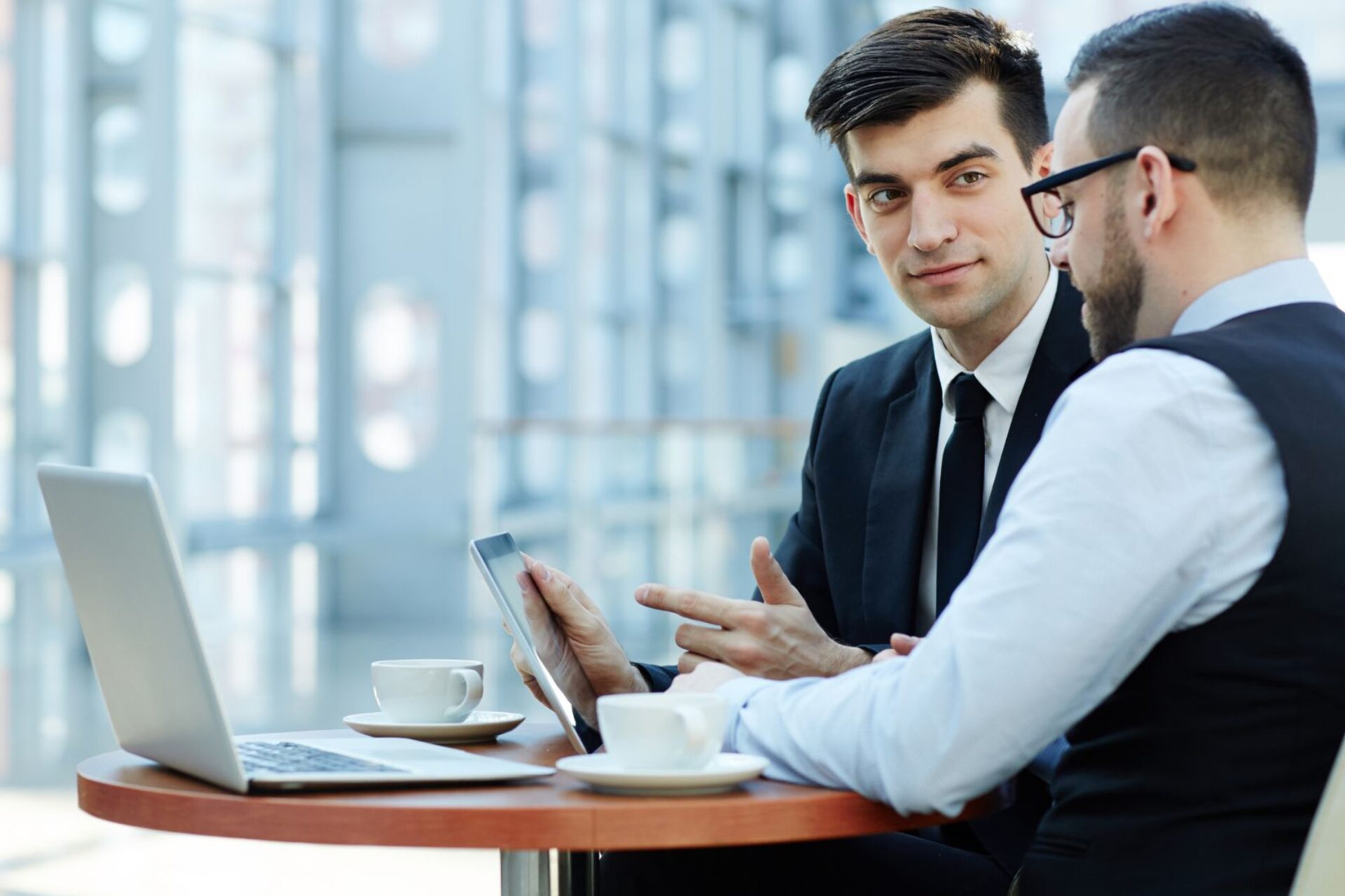 ACTICO keyvisual two men talking