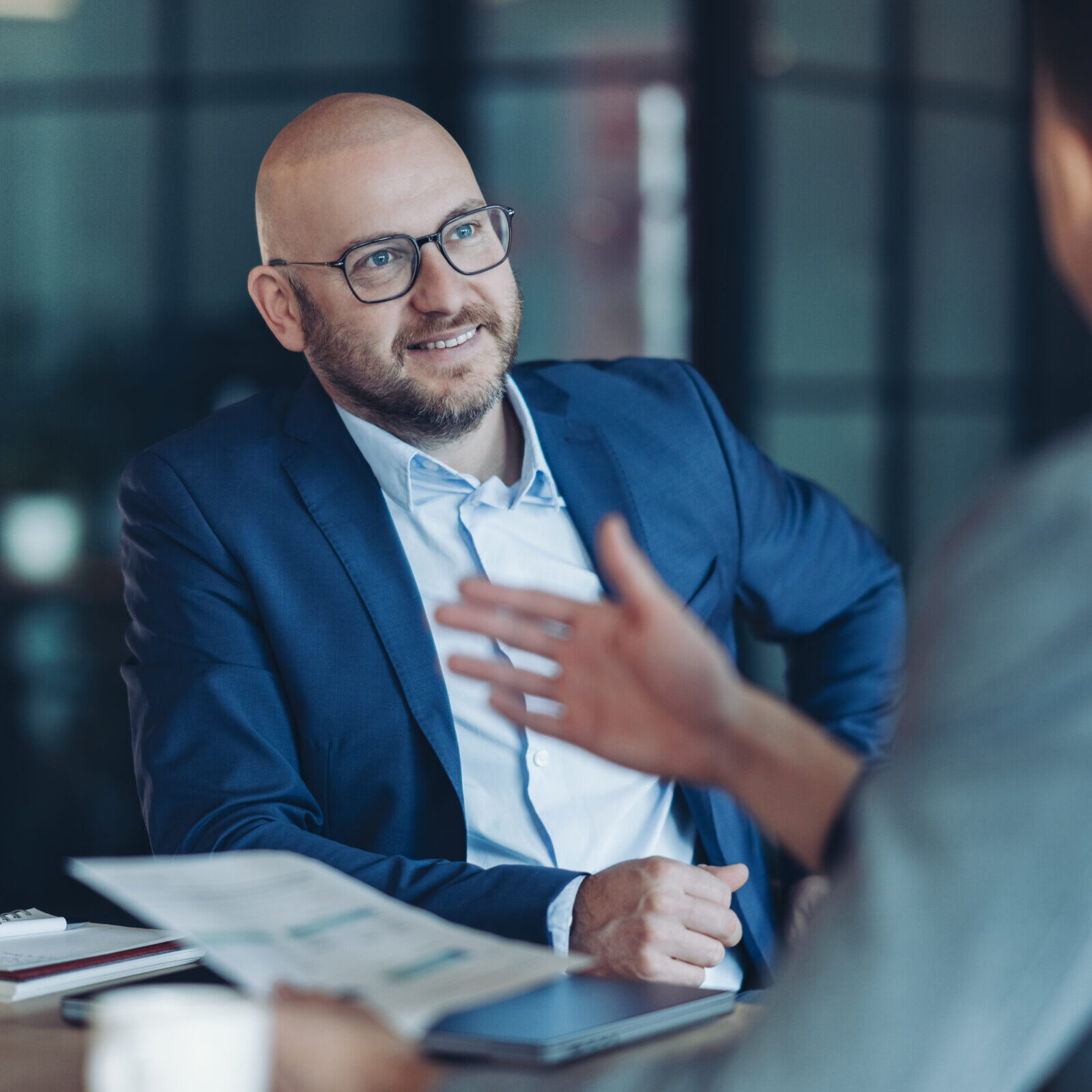 Focus on a middle age businessman during a meeting